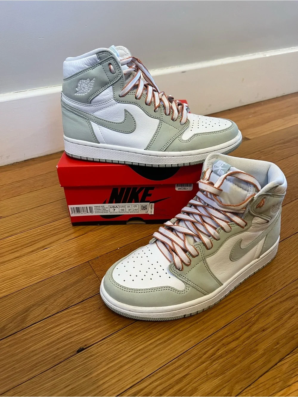 Nike Women’s High-Top Sneakers in White and Light Green